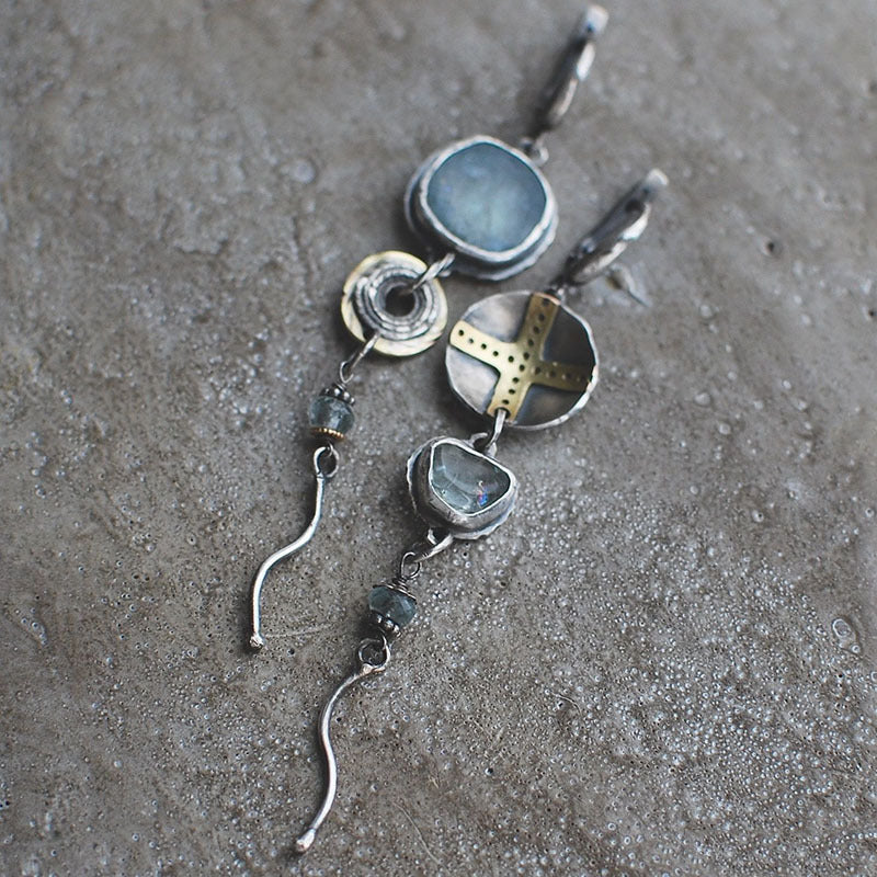 Blue Stone Cross Earrings" can be rewritten as "Blue Gemstone Cross Earrings.