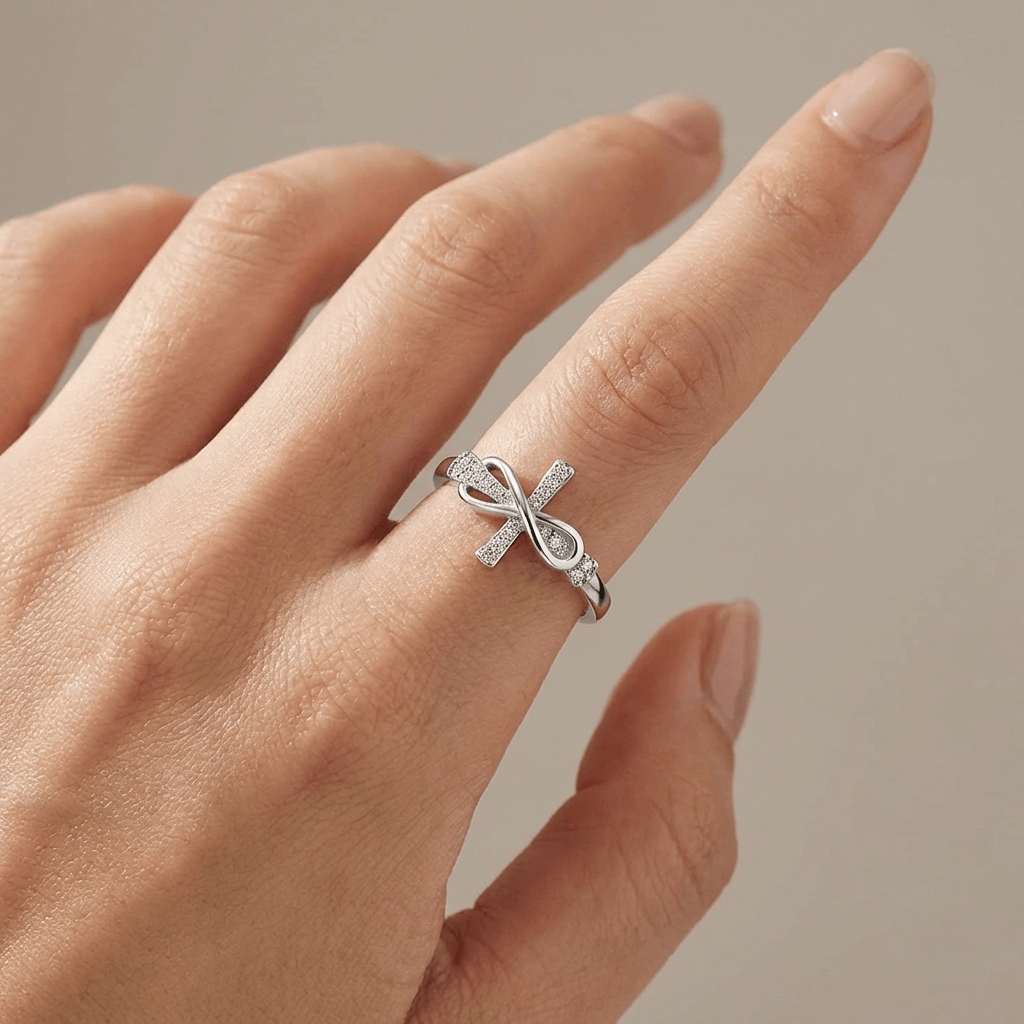 Adjustable Silver Cross and Bow Ring
