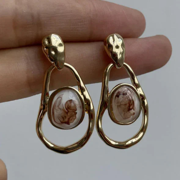 Gold Earrings with Unique White Stone