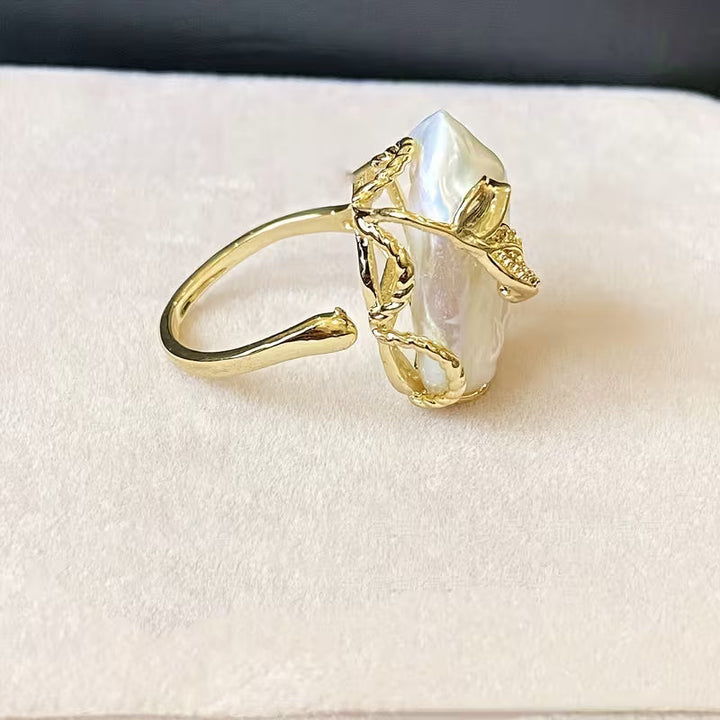 Natural Freshwater Pearl Engagement Ring" can be rewritten as "Freshwater Pearl Engagement Ring.