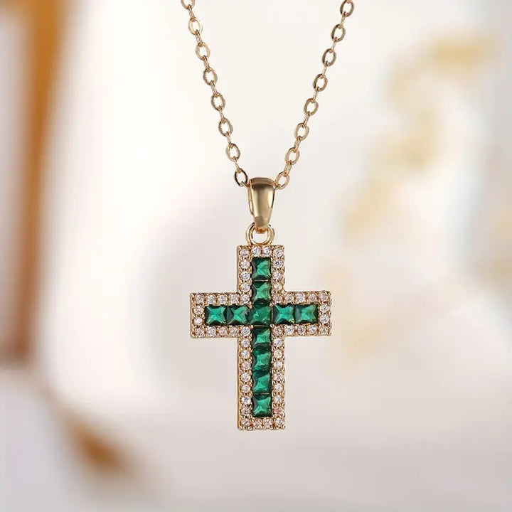 Emerald-Studded Gold Cross Necklace