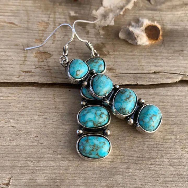 Vintage Red Turquoise Earrings" can be rewritten as "Retro Red Turquoise Earrings.