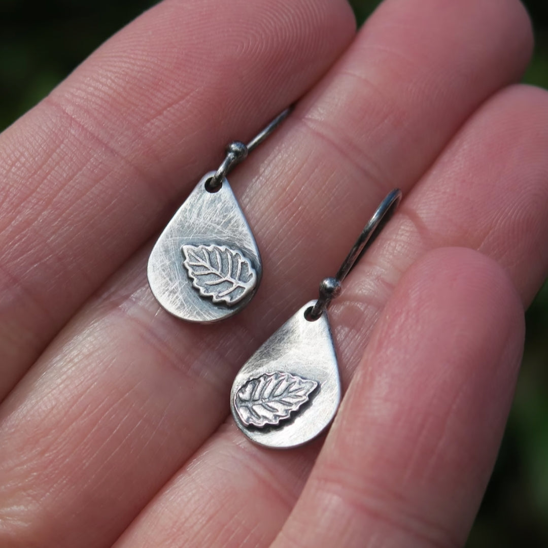 Silver Leaf Earrings" can be rewritten as "Elegant Silver Leaf Earrings.