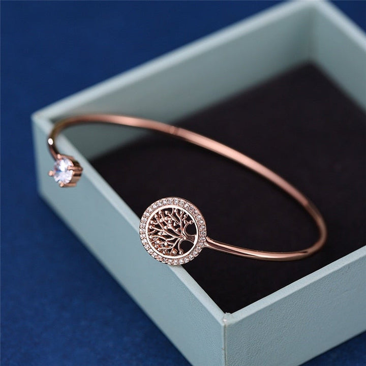 Adjustable Tree of Life Bracelet" can be rewritten as "Adjustable Tree of Life Charm Bracelet.