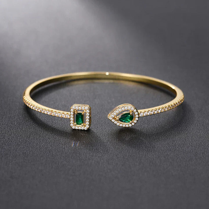 Claudia Emerald Bracelet" can be rewritten as "Claudia Emerald Gemstone Bracelet.