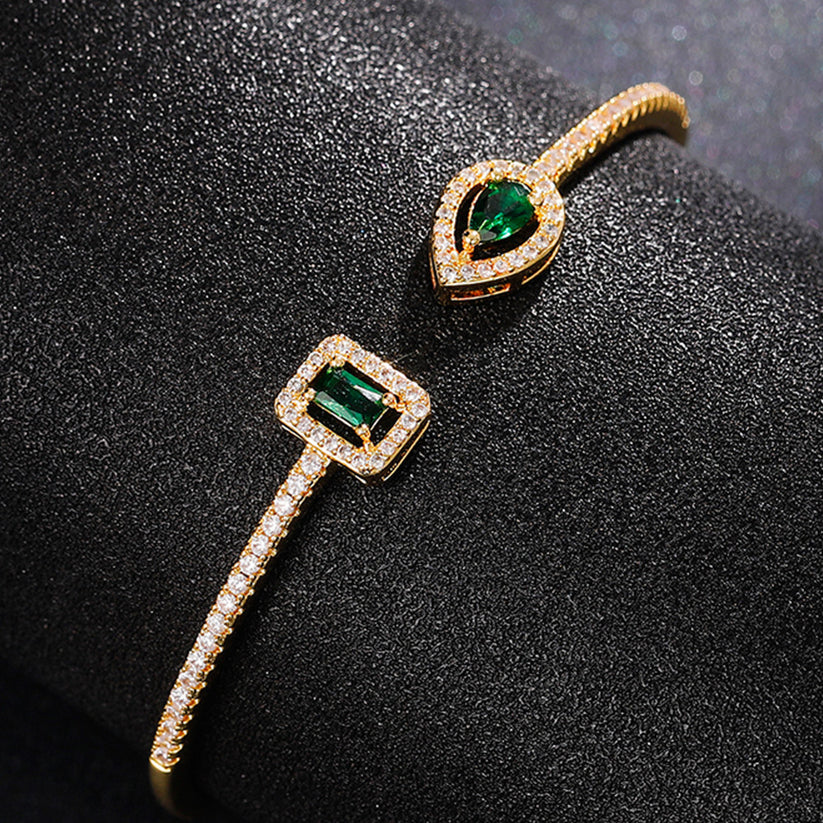 Claudia Emerald Bracelet" can be rewritten as "Claudia Emerald Gemstone Bracelet.
