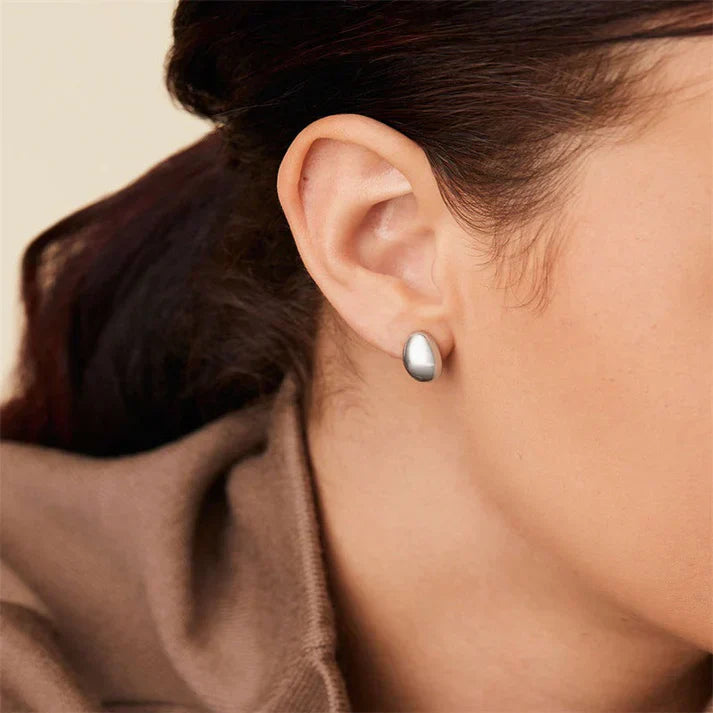 Lissandra Wedge Earrings" can be rewritten as "Lissandra Wedge Earrings - Stylish & Chic.