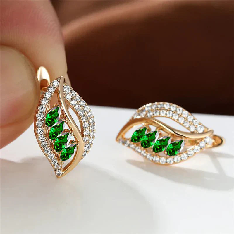 Emerald Leaf Earrings" can be rewritten as "Emerald Leaf Drop Earrings.