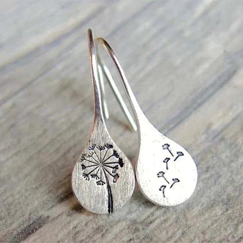 Exclusive Silver Dandelion Leaf Earrings" can be rewritten as "Unique Silver Dandelion Leaf Earrings.