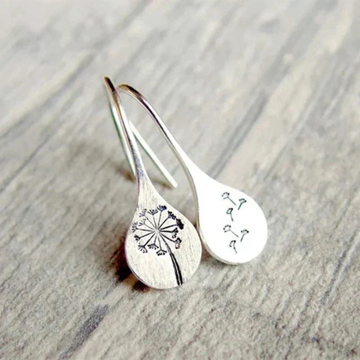 Exclusive Silver Dandelion Leaf Earrings" can be rewritten as "Unique Silver Dandelion Leaf Earrings.