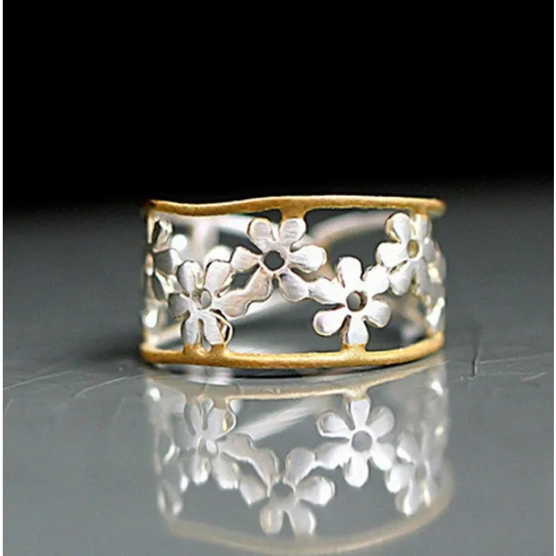 Gold Ring with Silver Leaf Accents