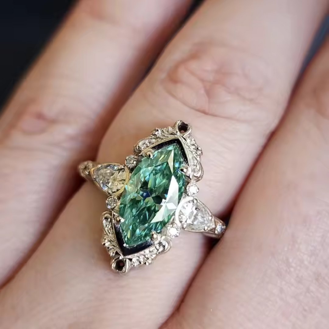 Elegant Marquise Emerald Ring