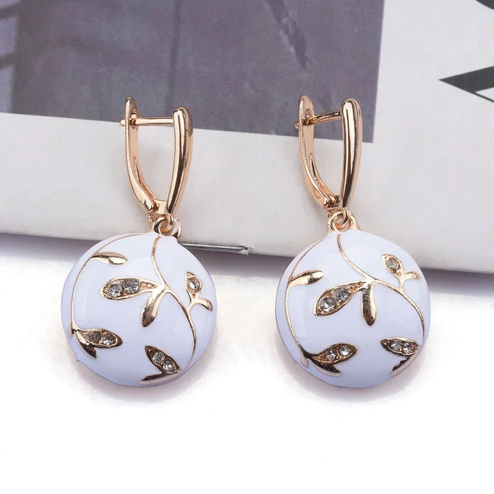 Gold and White Earrings