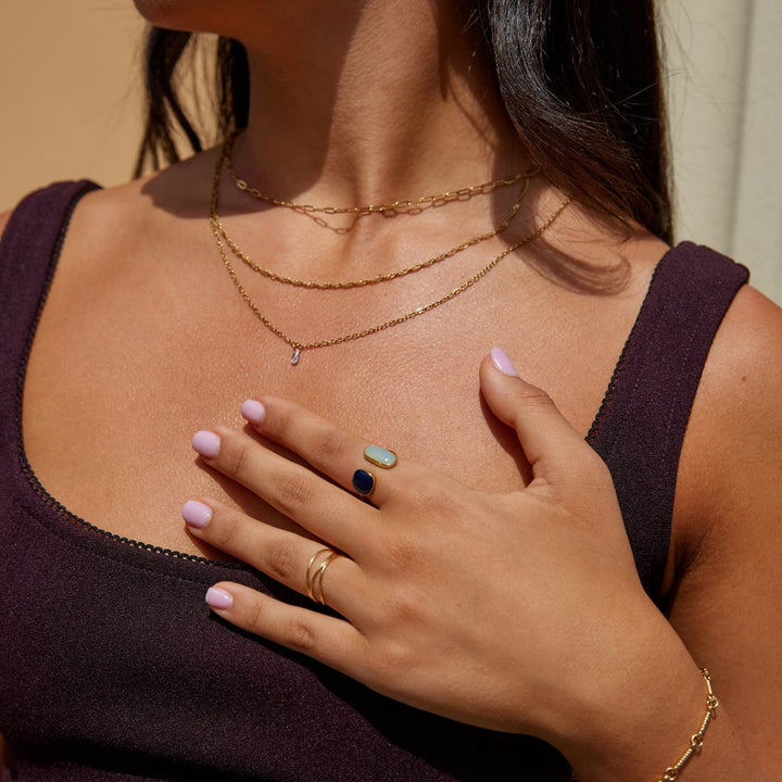 Aquamarine Wrap Ring" can be rewritten as "Elegant Aquamarine Wrap Ring.