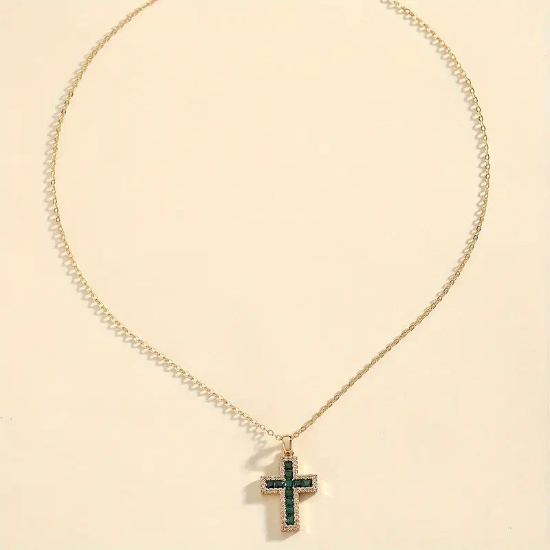 Emerald-Studded Gold Cross Necklace