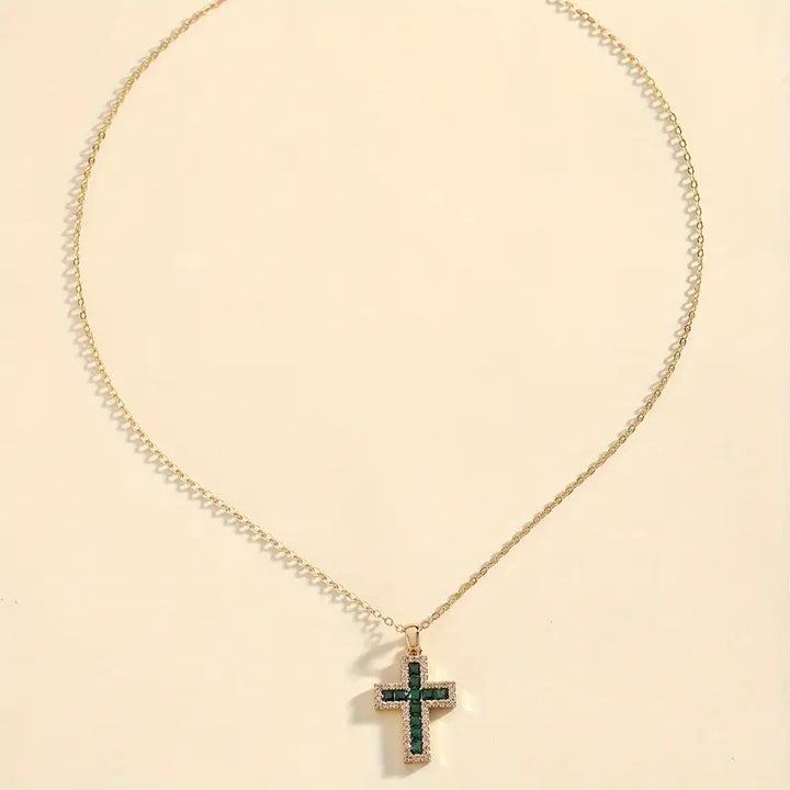Elegant Gold Necklace with Emerald Cross Pendant