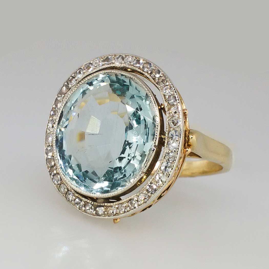 Gold Ring with Round Blue Crystal