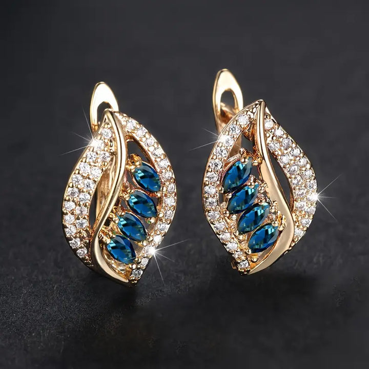 Golden Breeze Earrings" can be rewritten as "Golden Breeze Hoops.