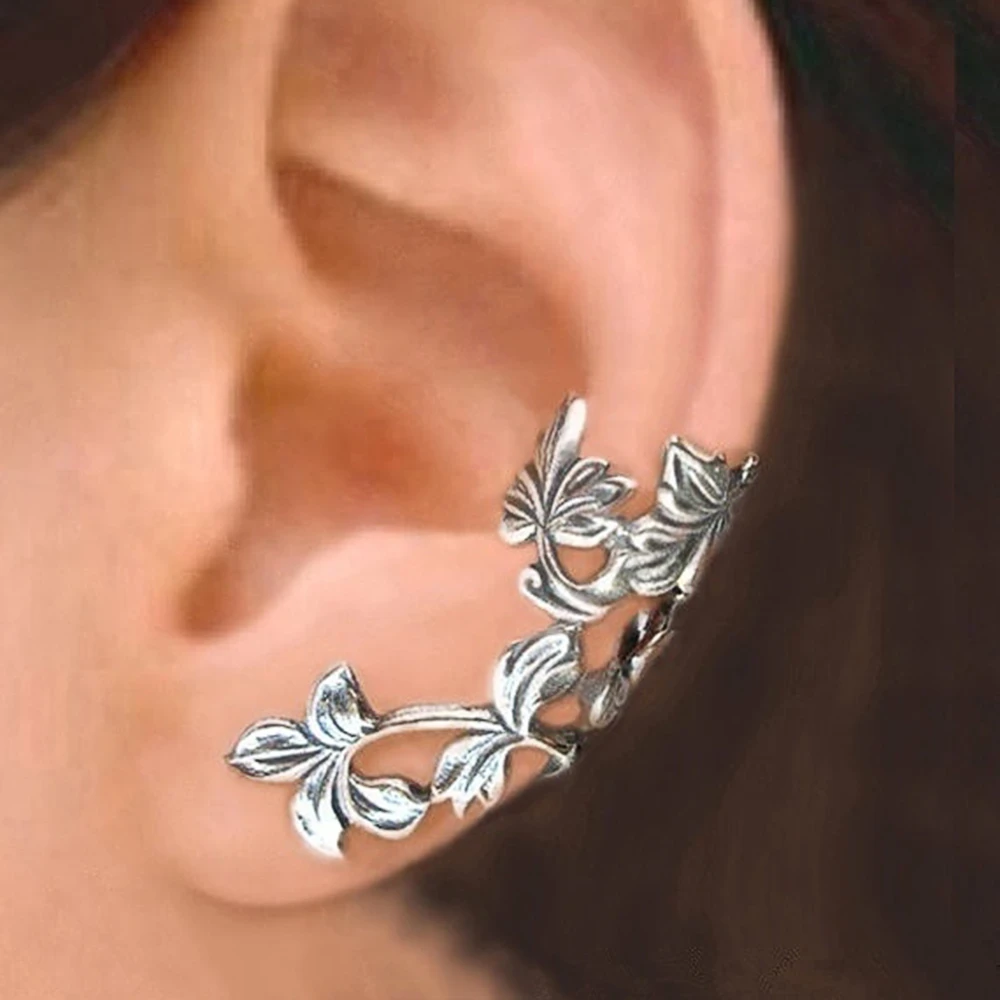 Exclusive Vintage Silver Leaf Earrings" can be rewritten as "Unique Vintage Silver Leaf Earrings.