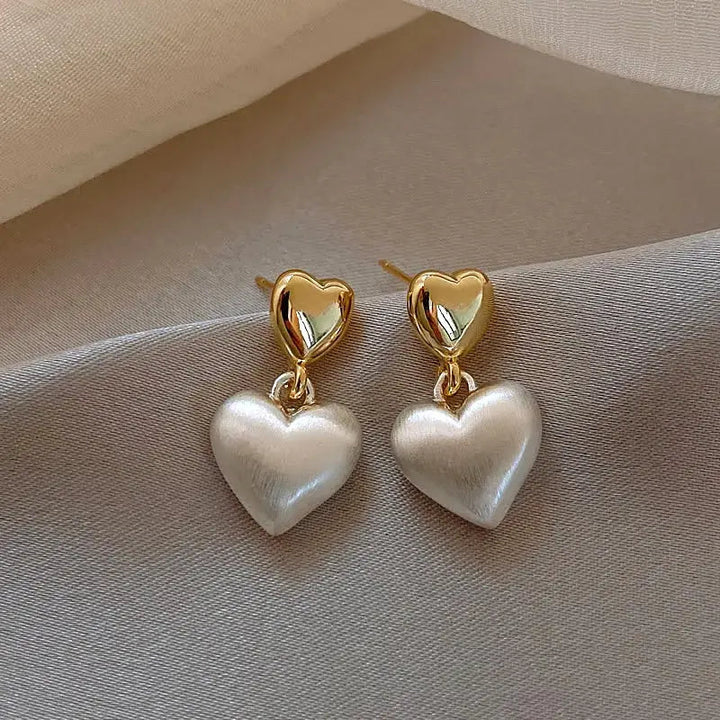 Elegant Heart-Shaped Golden Pearl Earrings