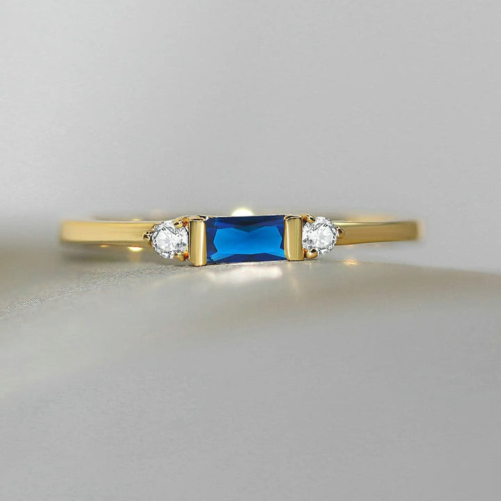 Stunning Blue Gold Center Sparkler Ring
